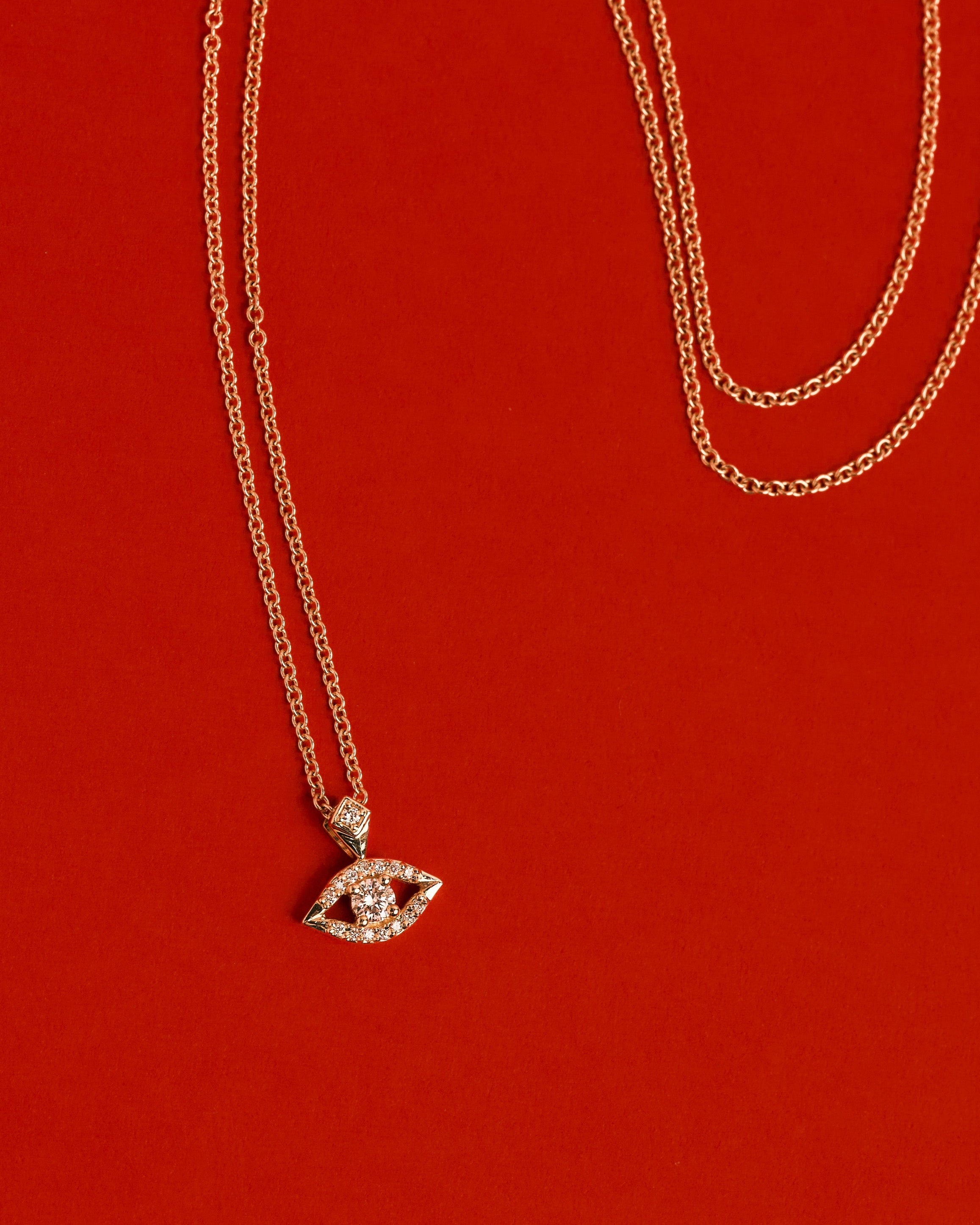 שרשרת זהב עין הרע משובצת יהלומים לבנים